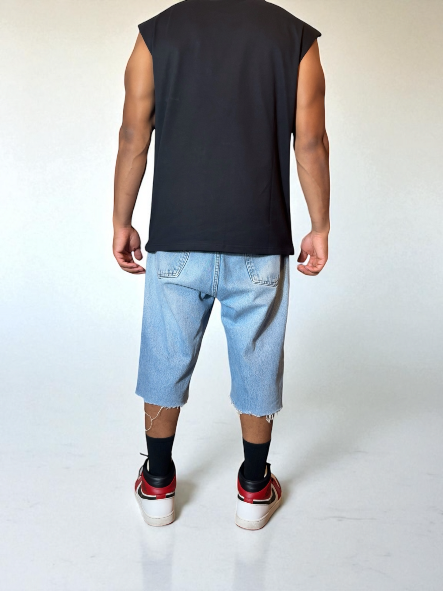 “World Tour” Sleeveless Tee – Black
